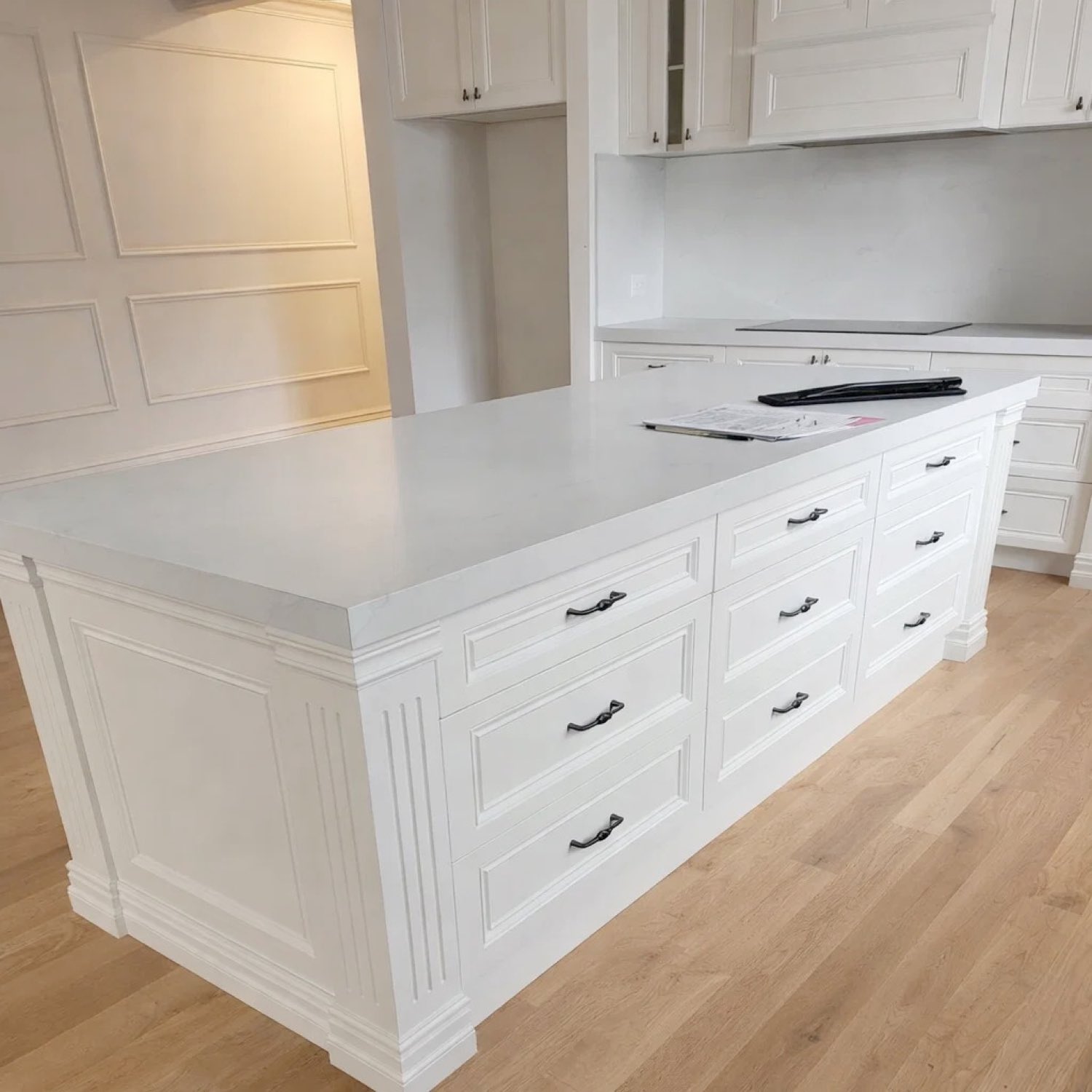 White shaker kitchen island with marble benchtop